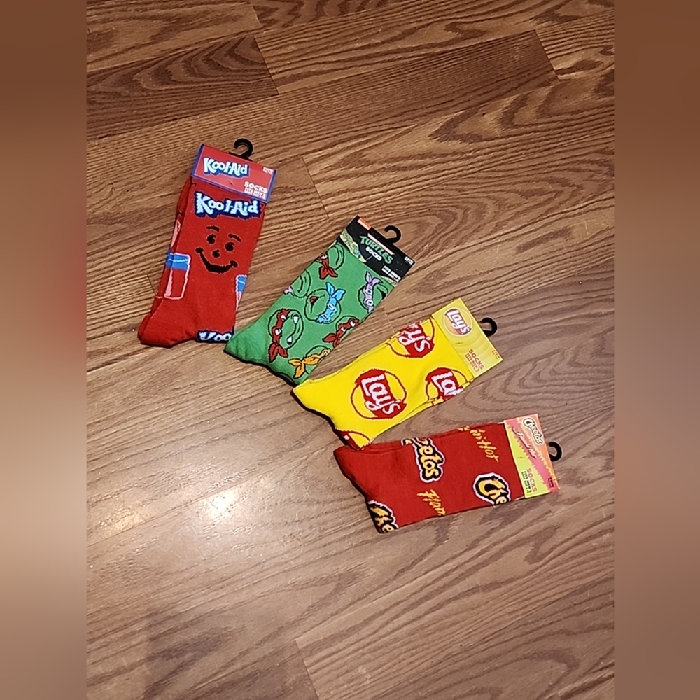 New with tags 4 pairs of fun socks, lays,Koolaid, Hot Cheetos, TMN turtles‎